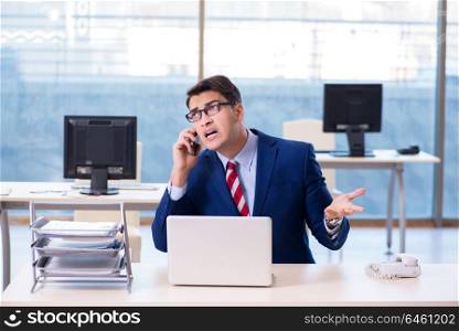 Businessman talking on the phone in the office
