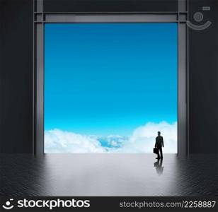 businessman thinking in factory and looking to sky as concept