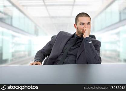 businessman thinking on a desk at the office