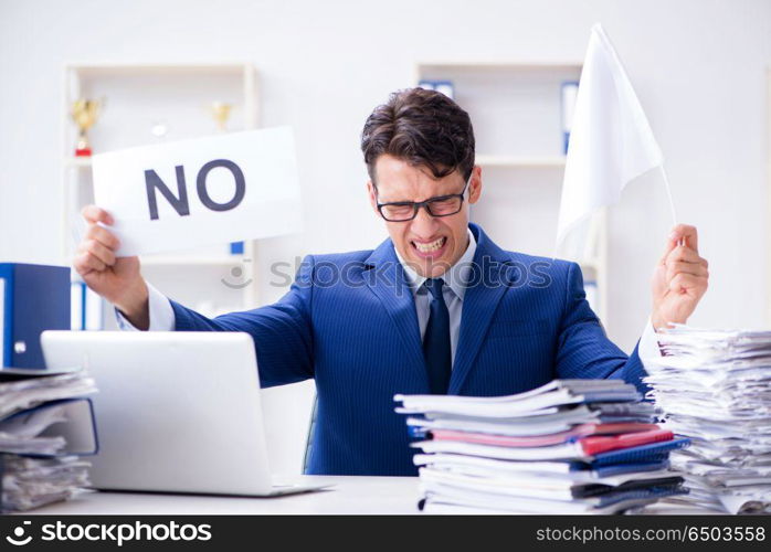 Businessman throwing white flag and giving up