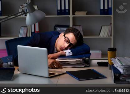Businessman tired and sleeping in the office after overtime hours. Businessman tired and sleeping in the office after overtime hour