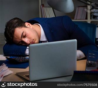 Businessman tired and sleeping in the office after overtime hours. Businessman tired and sleeping in the office after overtime hour