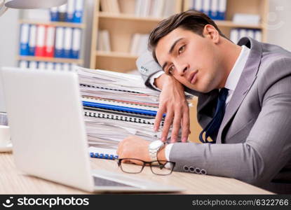 Businessman tired sitting in the office