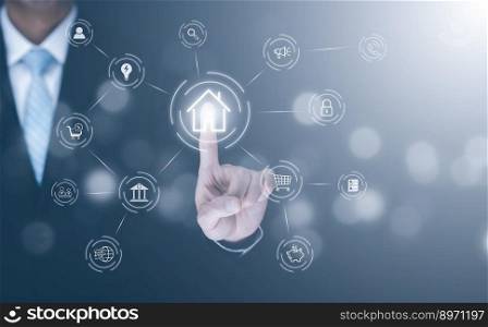 Businessman touch button Circular futuristic interface of smart home automation assistant on a virtual screen and a user touching a home button, digital big data and virtual technology,