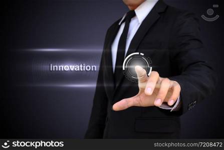 Businessman touching innovation button screen