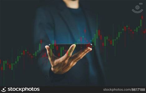 Businessman trading on mobile smartphone bitcoins cryptocurrency and stock market