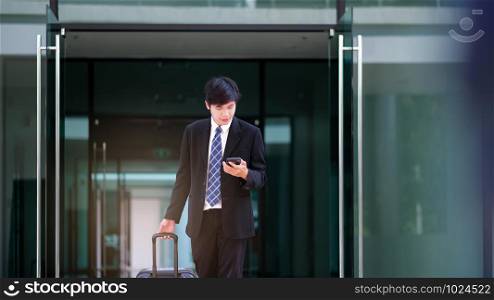 Businessman traveler journey business travel. Businessperson traveling with luggage.