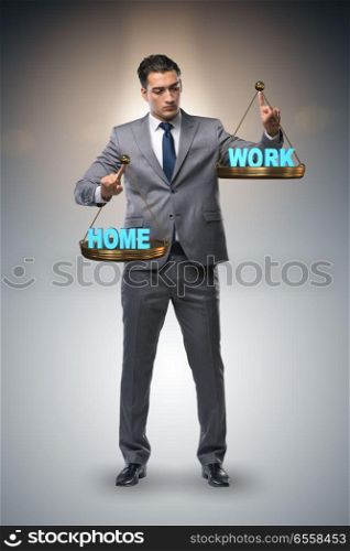 Businessman trying to find balance between home and work