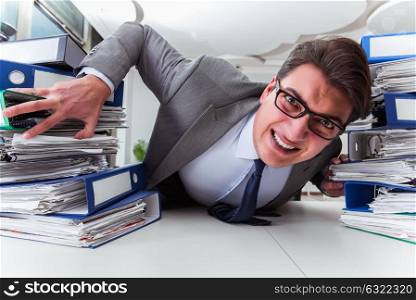 Businessman under stress due to excessive work