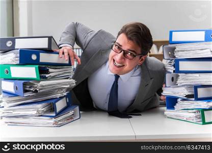 Businessman under stress due to excessive work