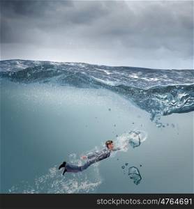 Businessman under water. Young businessman in suit swimming in stormy waters