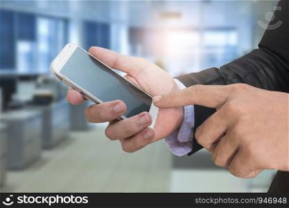 businessman use smartphone in office
