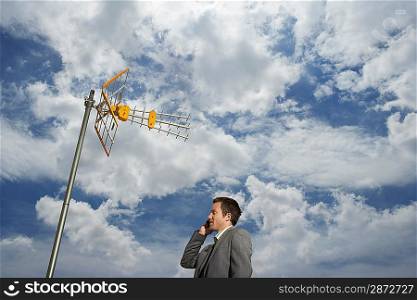 Businessman Using Cell Phone Outdoors