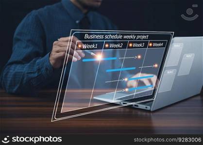 Businessman using computer for project business schedule by weekly, Business plan management concept
