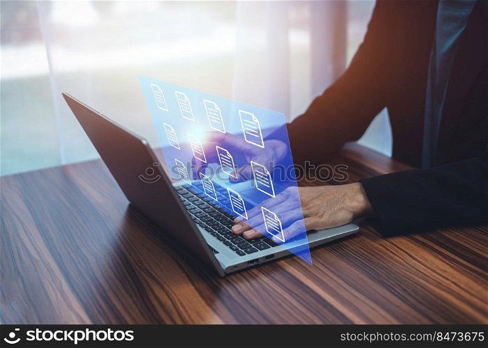 Businessman using ERP Enterprise Resource Planning document management concept with icons on virtual screen