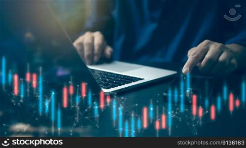 Businessman using laptop computer analysis graph stock market index diagrams, investment data, trading online.Business financial exchange.
