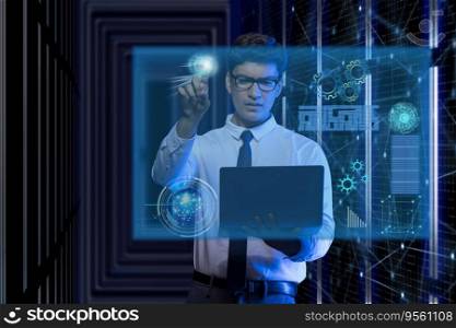Businessman using laptop touching on virtual screen