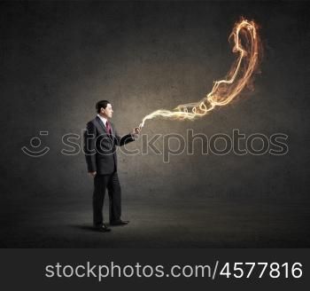 Businessman using mobile application. Businessman using his smartphone and glowing call sign of screen