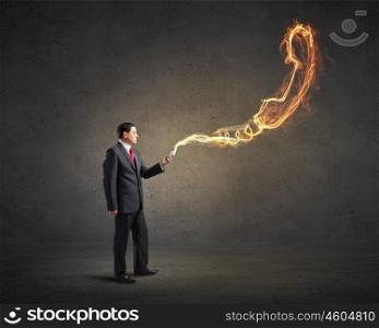 Businessman using mobile application. Businessman using his smartphone and glowing call sign of screen