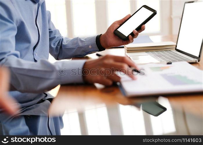 businessman using mobile phone. startup man working at workplace. male entrepreneur with smart phone.