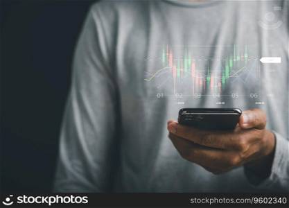 Businessman using smartphone for online stock trading, monitoring market data and charts. Technology and financial success in world of trading and investing. Technical price graph and indicator