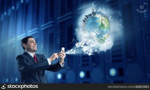 Businessman using smartphone. Senior businessman using his smartphone for business and communication. Elements of this image are furnished by NASA
