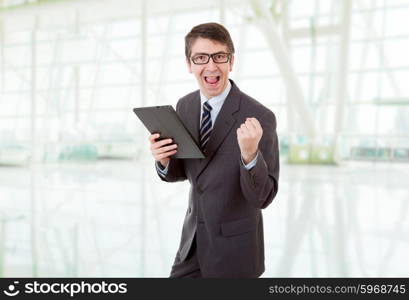 businessman using touch pad of tablet pc, at the office