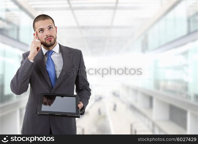businessman using touch pad of tablet pc at the office