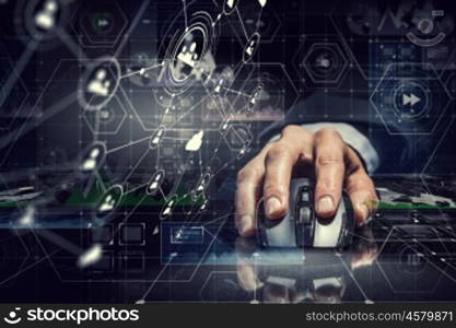 Businessman using wireless mouse. Hand of businessman on dark 3D rendering background using wireless mouse