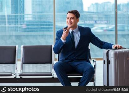 Businessman waiting at the airport for his plane in business cla. Businessman waiting at the airport for his plane in business class. Businessman waiting at the airport for his plane in business cla