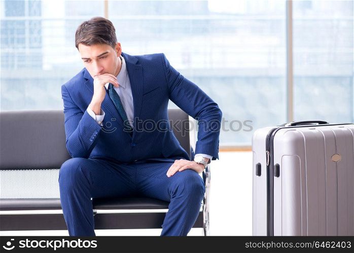 Businessman waiting at the airport for his plane in business class. Businessman waiting at the airport for his plane in business cla