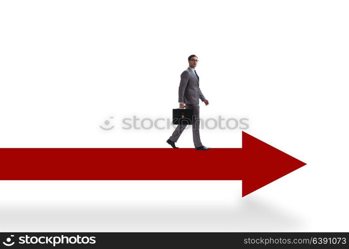 Businessman walking on arrow isolated on white background