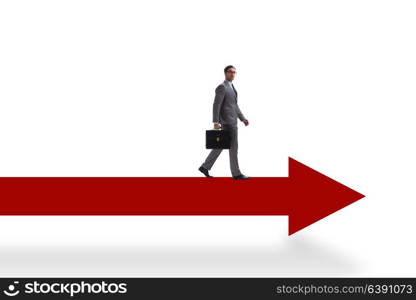 Businessman walking on arrow isolated on white background