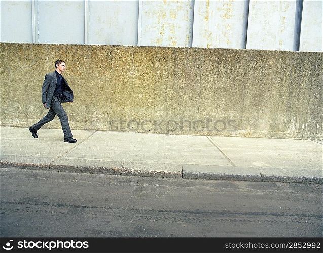 Businessman Walking on Street