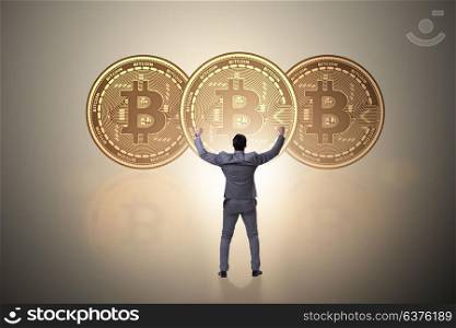 Businessman walking towards bitcoins in cryptocurrency blockchain concept. Businessman walking towards bitcoins in cryptocurrency blockchai