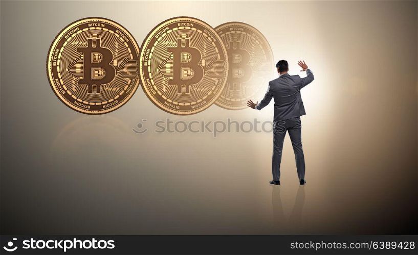 Businessman walking towards bitcoins in cryptocurrency blockchain concept. Businessman walking towards bitcoins in cryptocurrency blockchai