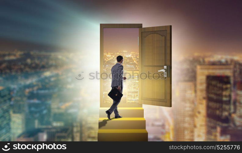 Businessman walking towards open door