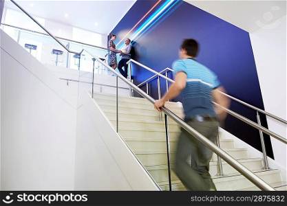 Businessman Walking Up Stairs