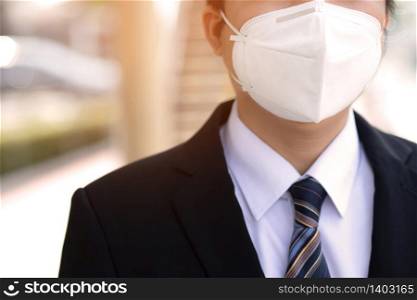 Businessman wear a mask to prevent germs, corona virus or covid-19.