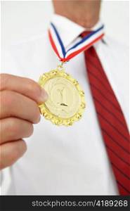 Businessman wearing medal