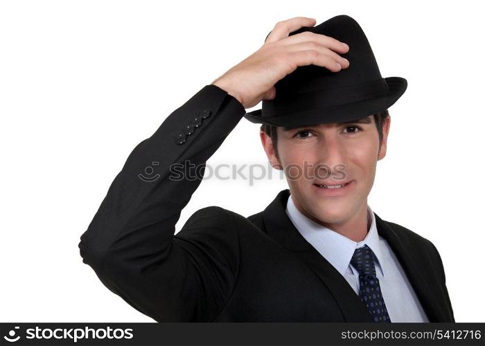 Businessman wearing trilby