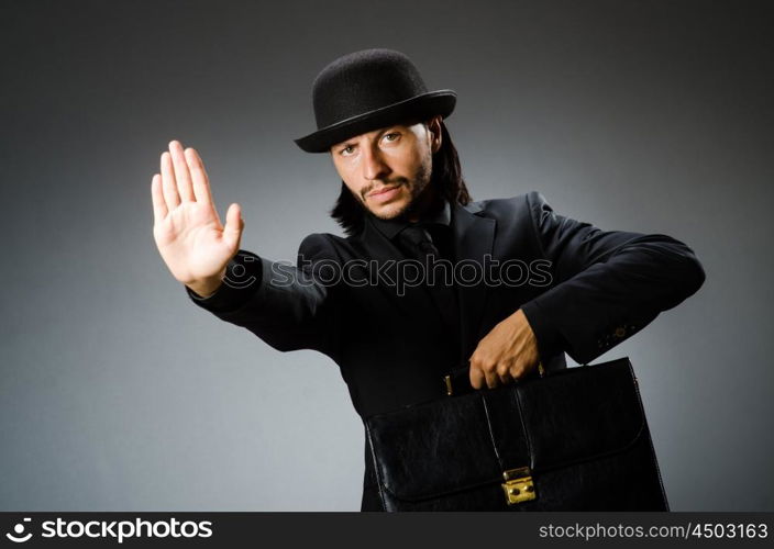 Businessman wearing vintage concept with briefcase