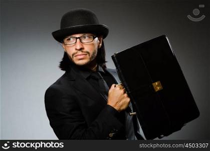Businessman wearing vintage concept with briefcase