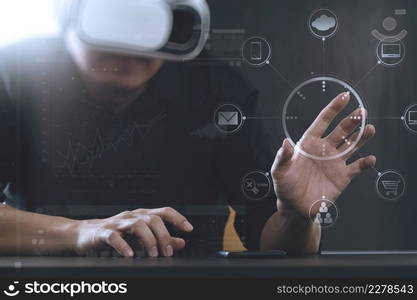 businessman wearing virtual reality goggles in modern office with Smartphone using with VR headset with screen icon diagram