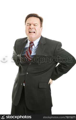 Businessman with a backache, in terrible pain. Isolated on white.