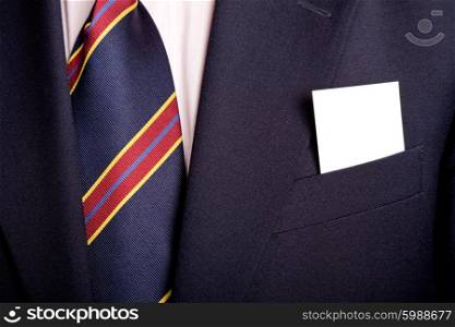 businessman with a blank business card in his pocket