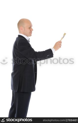 businessman with a brush in his hand. Isolated on white background
