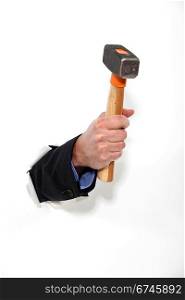 Businessman with a hammer