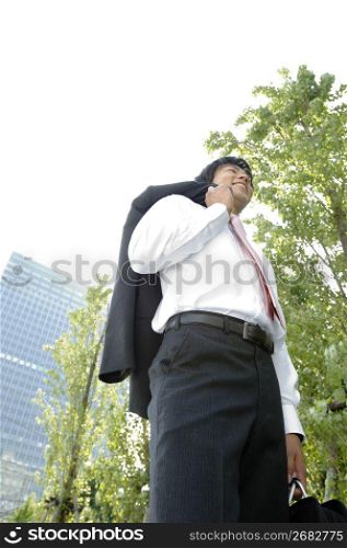 Businessman with a jacket over a shoulder
