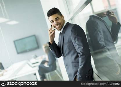 Businessman with a phone in the office